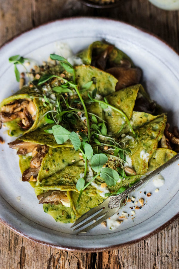 Spinach Crepes with Mushrooms, Basil Pesto & Tahini Dressing